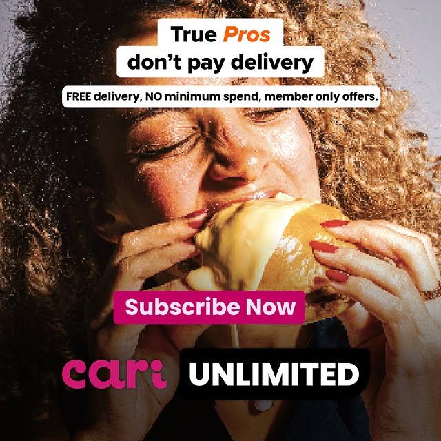 Woman eating a burger beneath a Cari Unlimited graphic with free-delivery offer text.