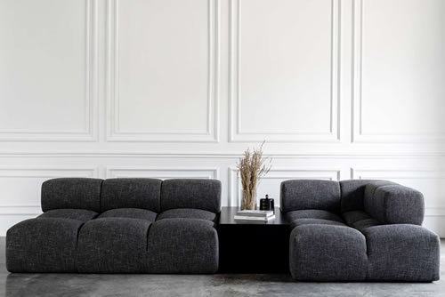 The Design House Dubai modular sofa in a monochrome interior.